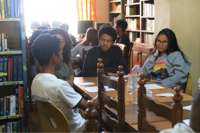 A book with his readers during the Human Library at Simeon Rajaona Library in Antananarivo.