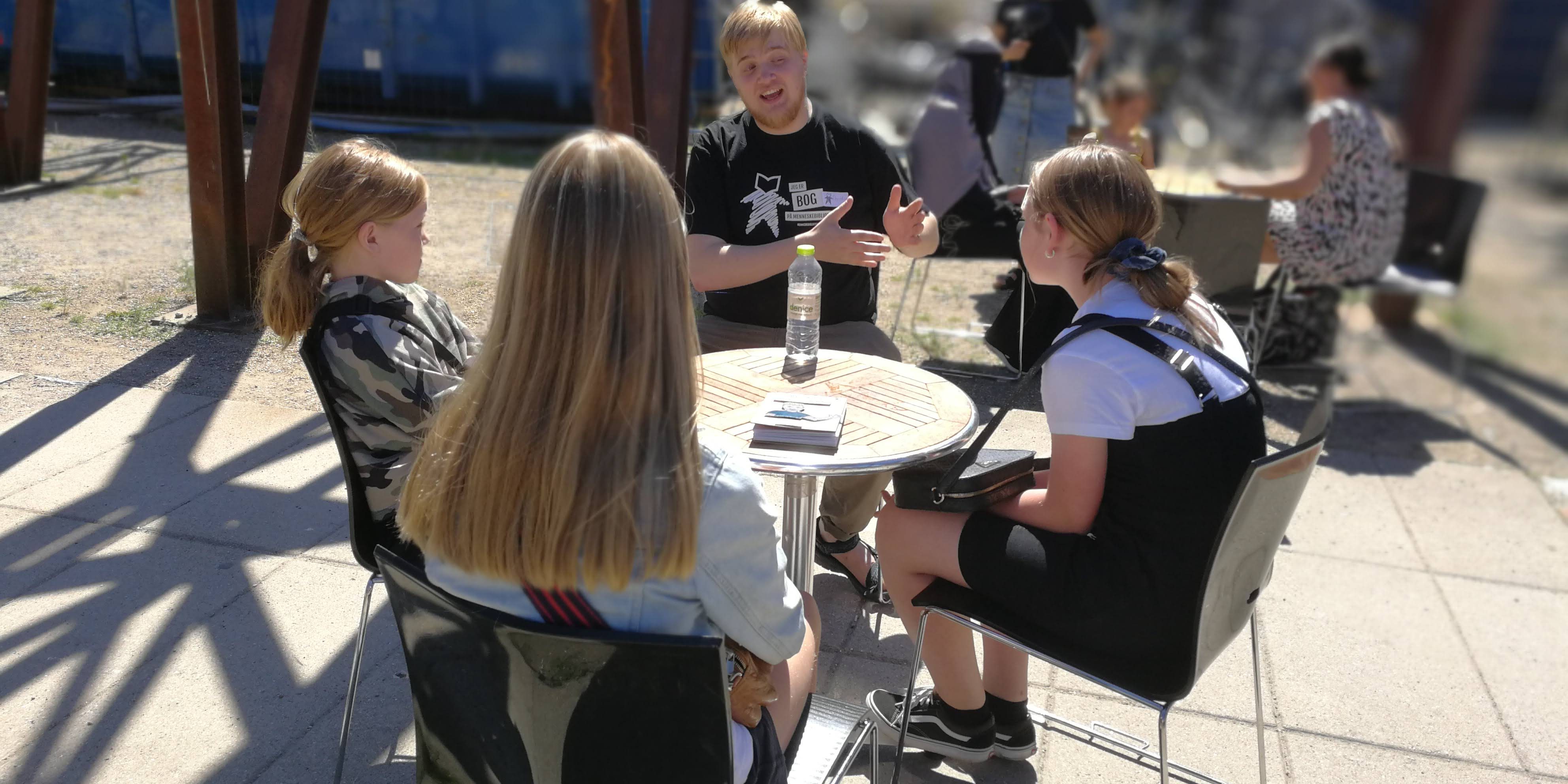 The boy who heard voices with his young readers.