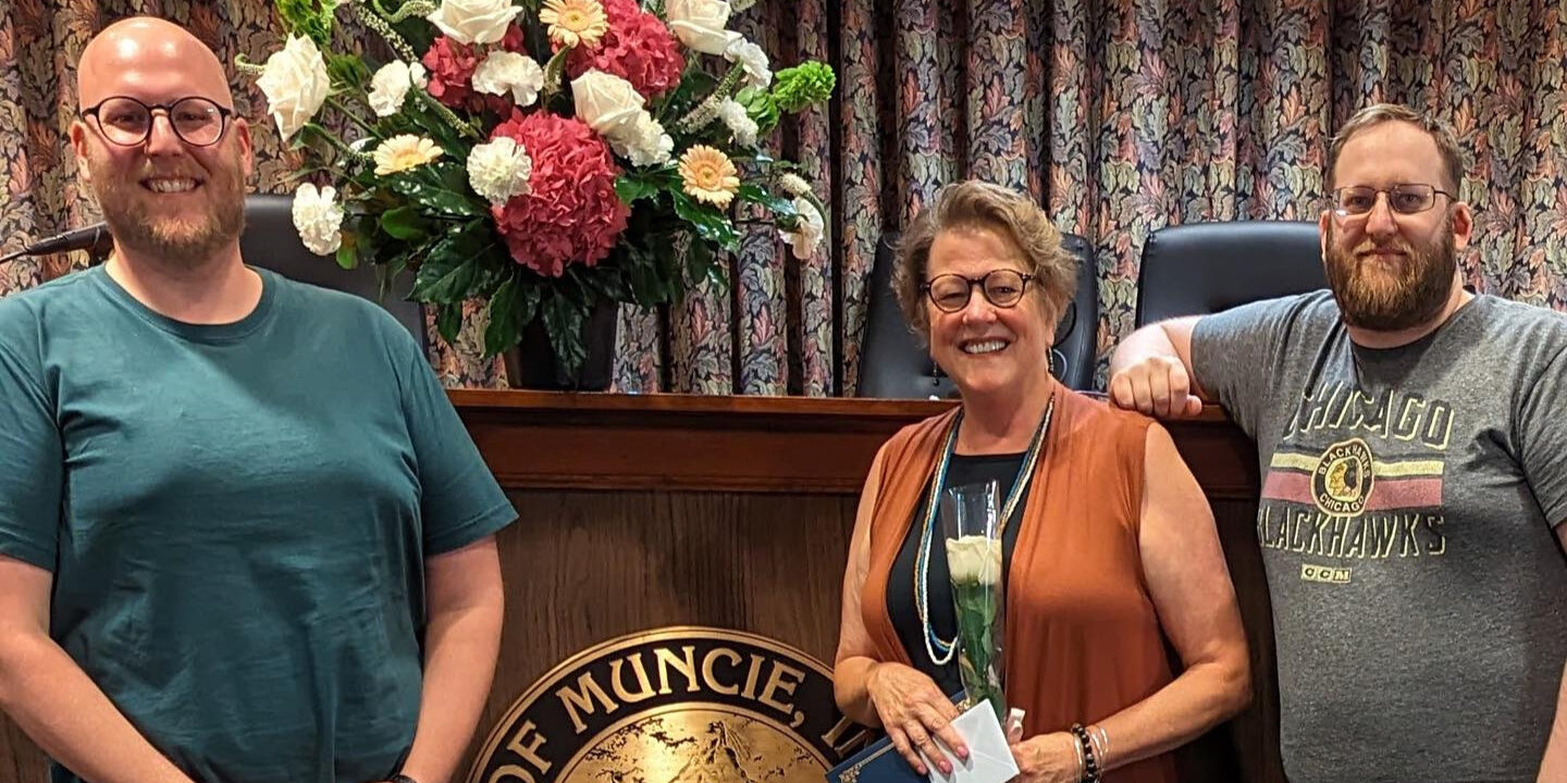 Peggy Lewis center with her two sons. Peggy Lewis center with her two sons.