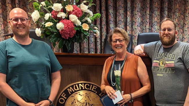 Peggy Lewis center with her two sons.